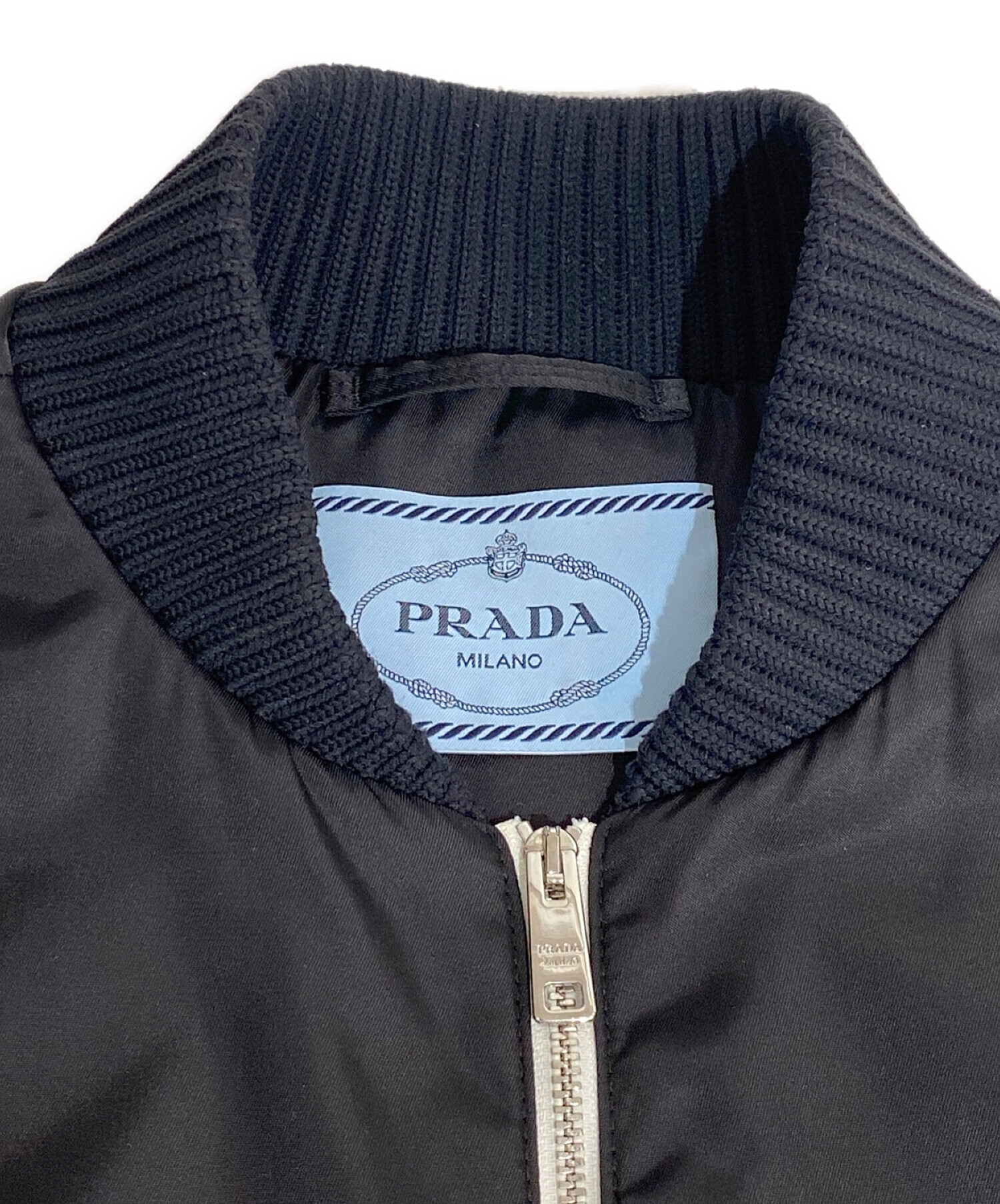 カラーPRADA ナイロンジャケット サイズ38 ブルー プラダ 三角プレート